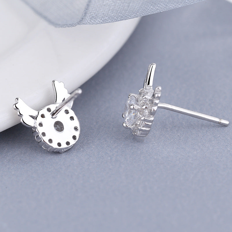 Women's earrings with sparkling crystals and playfully designed wings Symbol Fashion