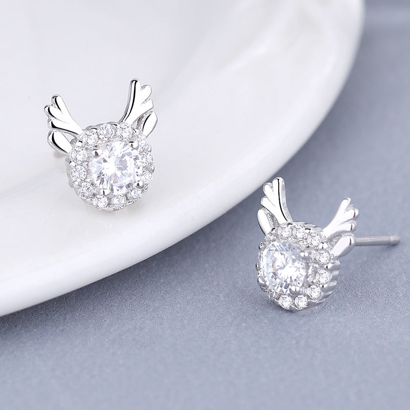 Women's earrings with sparkling crystals and playfully designed wings Symbol Fashion