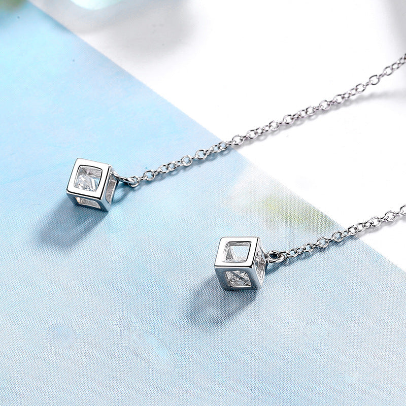Women's earrings with elegant square pendant and shimmering zirconia Symbol Fashion