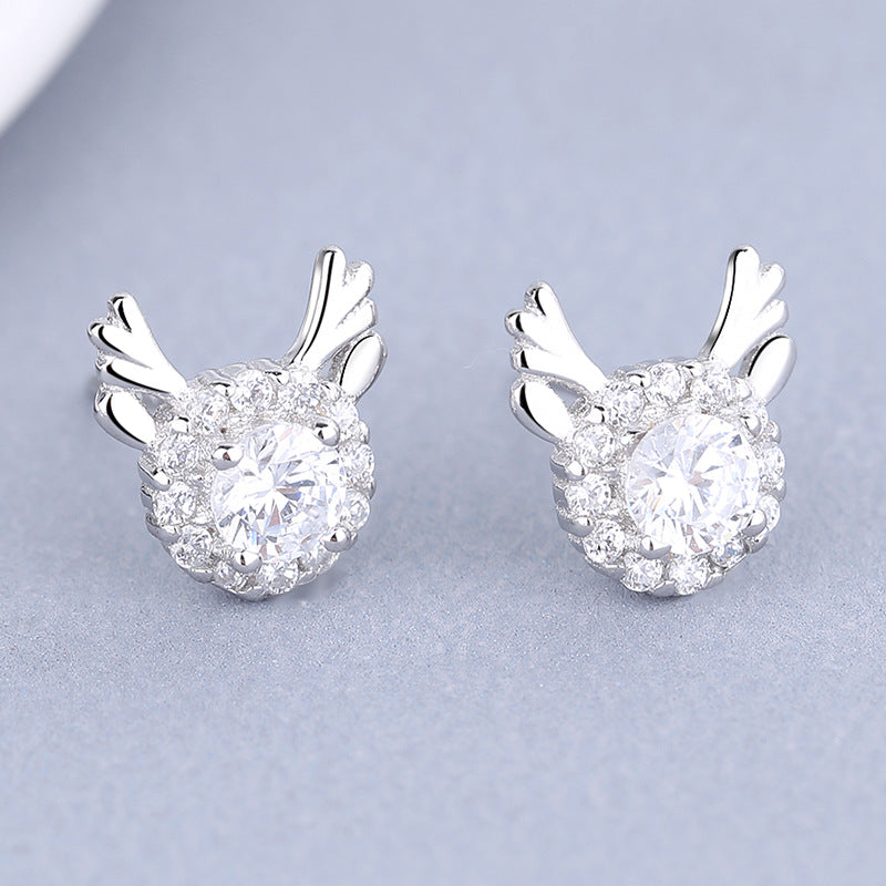 Women's earrings with sparkling crystals and playfully designed wings Symbol Fashion