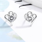 Women’s stud earrings with stylish heart design and sparkling crystals Symbol Fashion