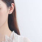 Women’s stud earrings with stylish heart design and sparkling crystals Symbol Fashion