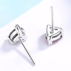 Women's earrings with sparkling heart accents made of high-quality stainless steel Symbol Fashion