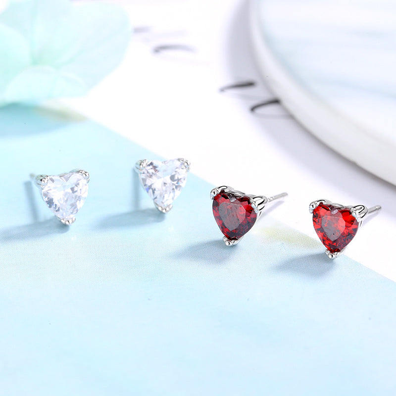 Women's earrings with sparkling heart accents made of high-quality stainless steel Symbol Fashion