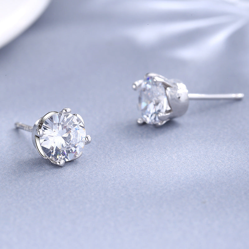 Ladies earrings with sparkling crystals in exquisite wreath design Symbol Fashion
