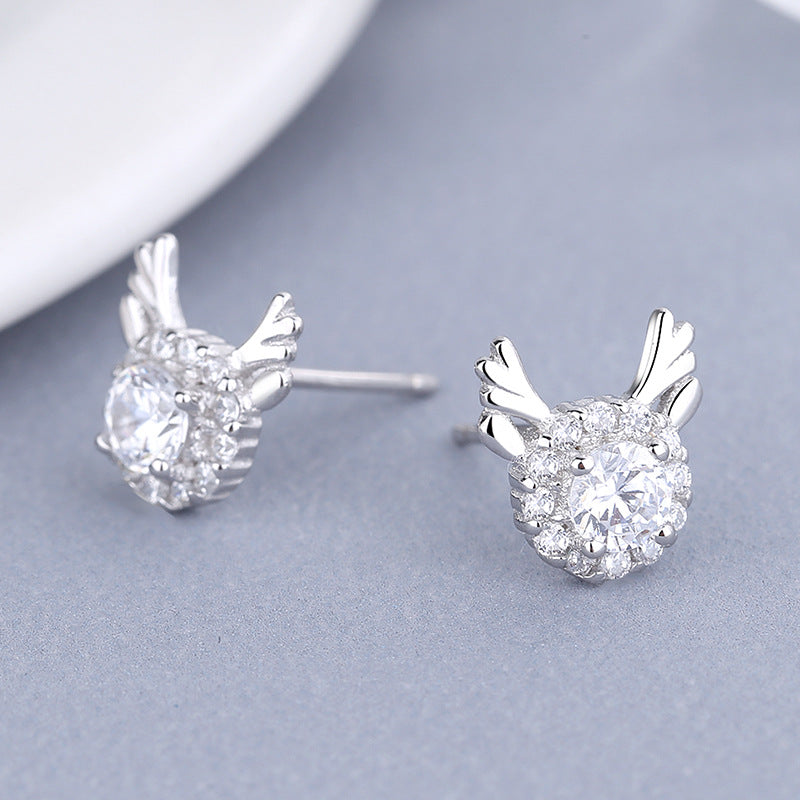 Women's earrings with sparkling crystals and playfully designed wings Symbol Fashion