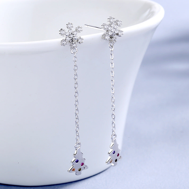 Women’s earrings with sparkling snowflake pendant and chain embellishment Symbol Fashion