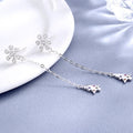 Women’s earrings with sparkling snowflake pendant and chain embellishment Symbol Fashion