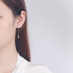 Women’s earrings with sparkling snowflake pendant and chain embellishment Symbol Fashion