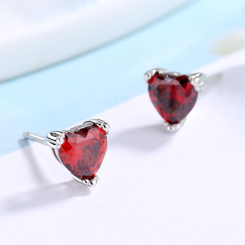 Women's earrings with sparkling heart accents made of high-quality stainless steel Symbol Fashion
