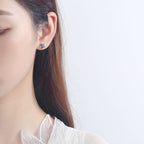 Women's stud earrings with delicate flower design and sparkling crystals Symbol Fashion