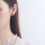 Ladies earrings with sparkling crystals in exquisite wreath design Symbol Fashion