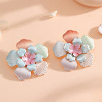 Ladies' flower earrings with intricate design and glossy accents Symbol Fashion