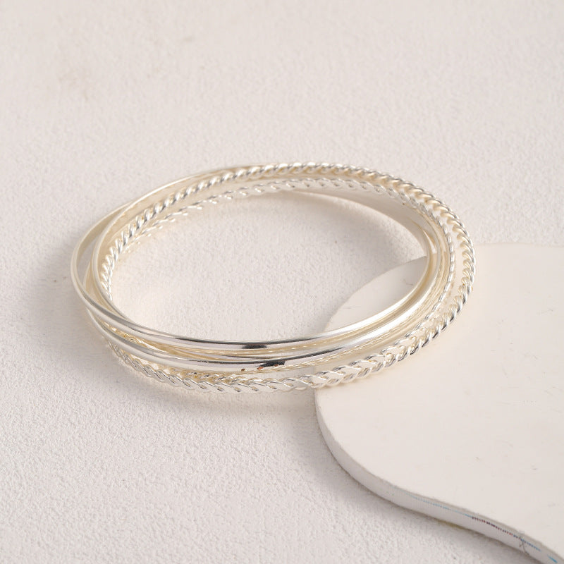Women's bangle set with elaborate, braided and simple designs Symbol Fashion