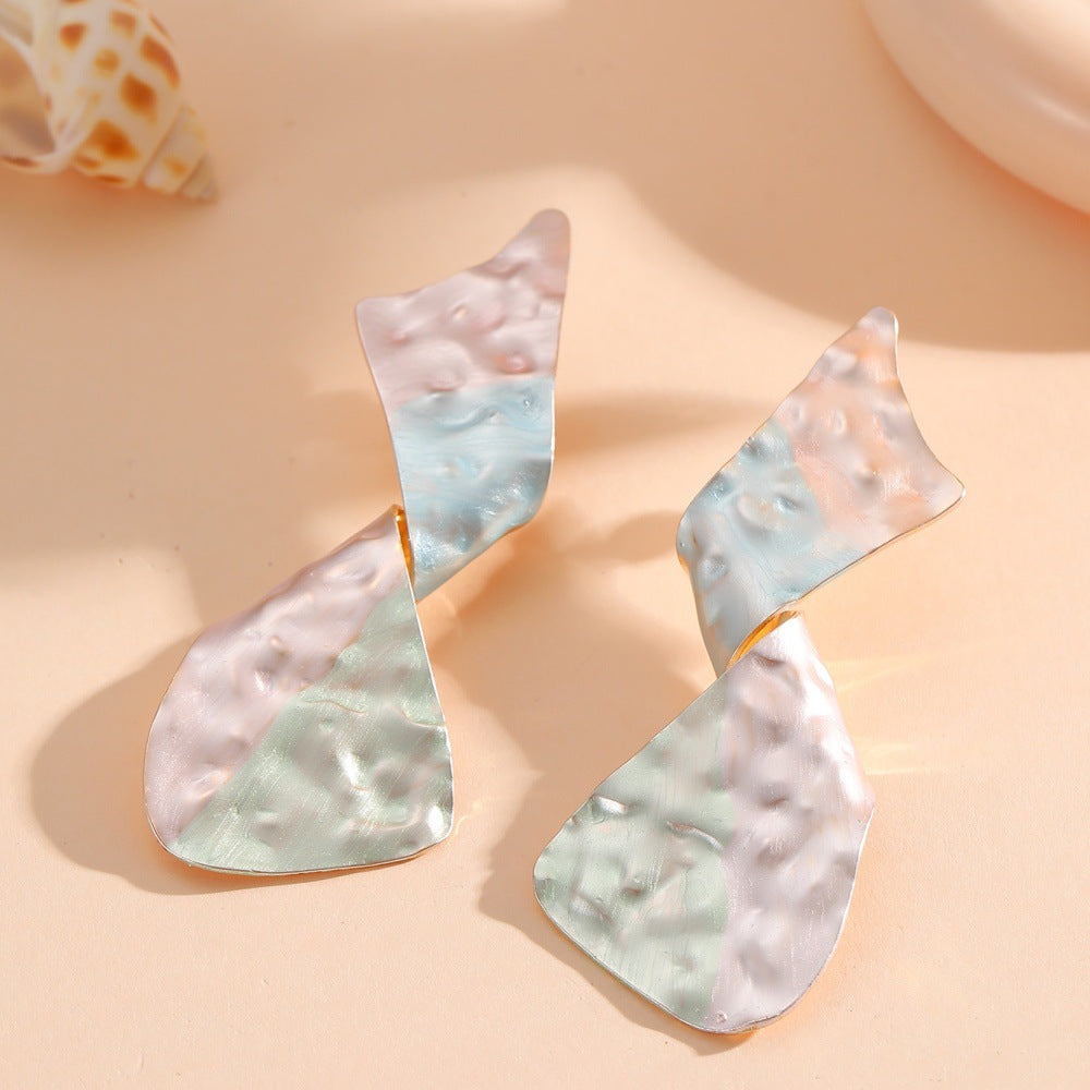 Ladies earrings in modern disc design Symbol Fashion