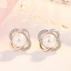 Ladies earrings with artistic pearl design and sparkling zirconia Symbol Fashion