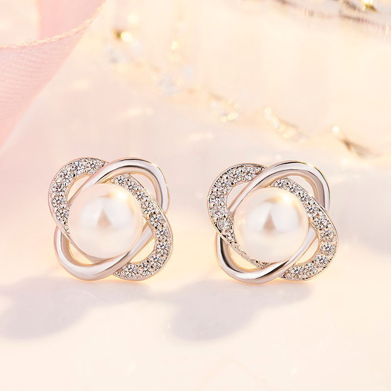 Ladies earrings with artistic pearl design and sparkling zirconia Symbol Fashion