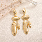 Women Hanging Earrings with artistic, three-dimensional design Symbol Fashion