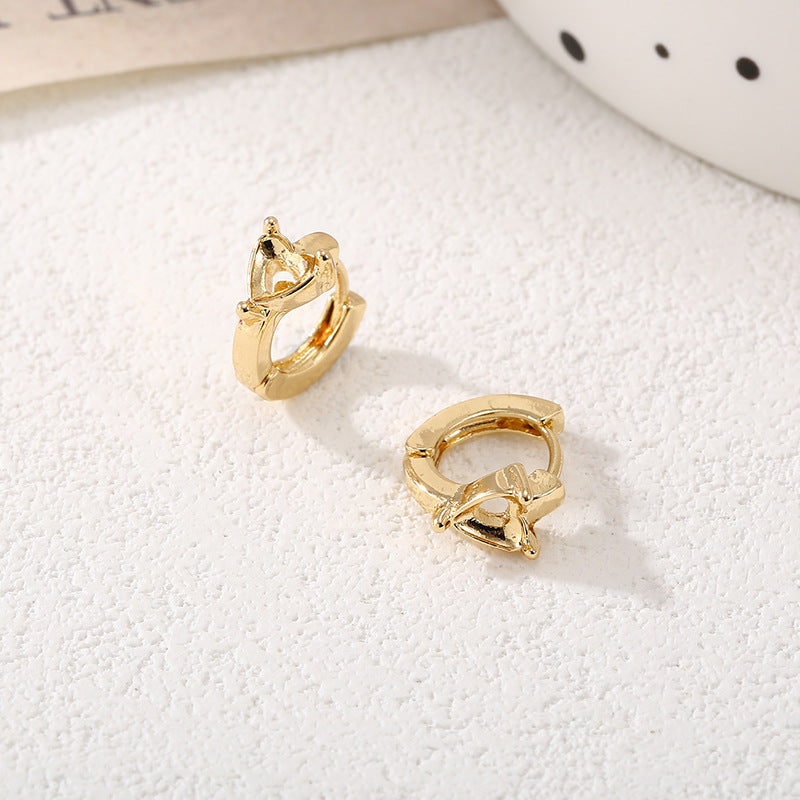 Ladies hoops in unique, sculptural design Symbol Fashion