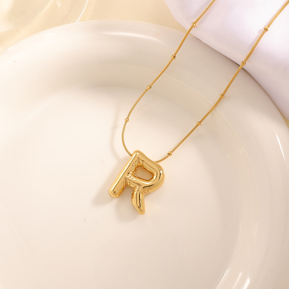 Women's necklace with curved letter pendant Symbol Fashion