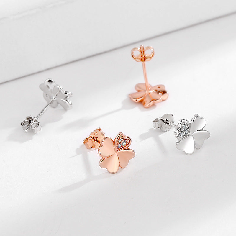 Ladies earrings in modern floral design Symbol Fashion