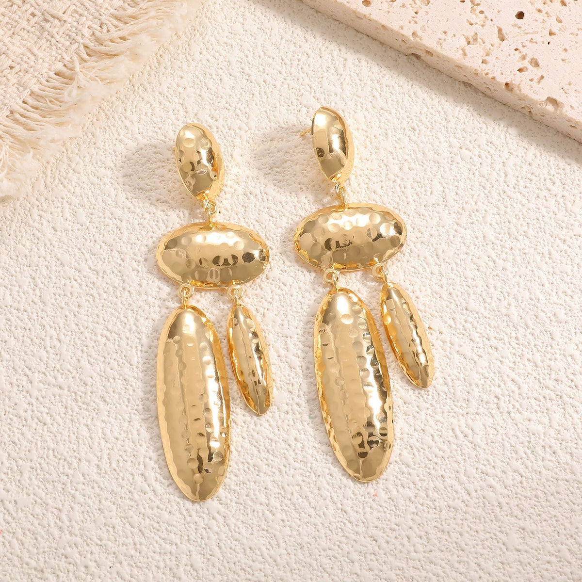 Women Hanging Earrings with artistic, three-dimensional design Symbol Fashion