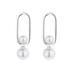 Women's stud earrings with modern oval design and elegant pearls Symbol Fashion