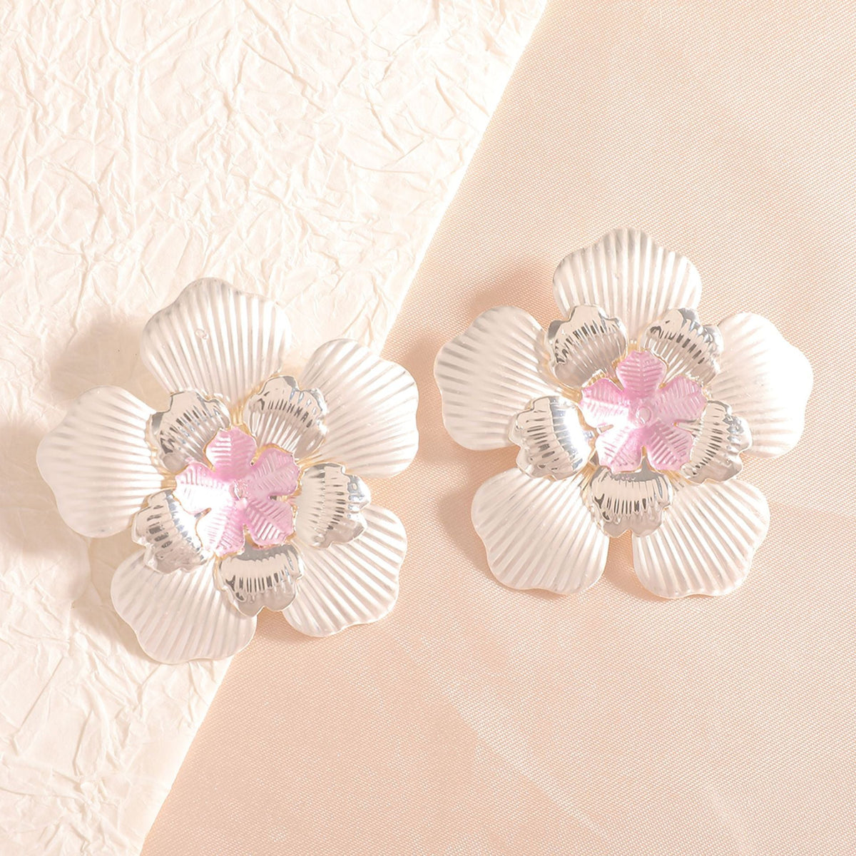 Ladies' flower earrings with intricate design and glossy accents Symbol Fashion