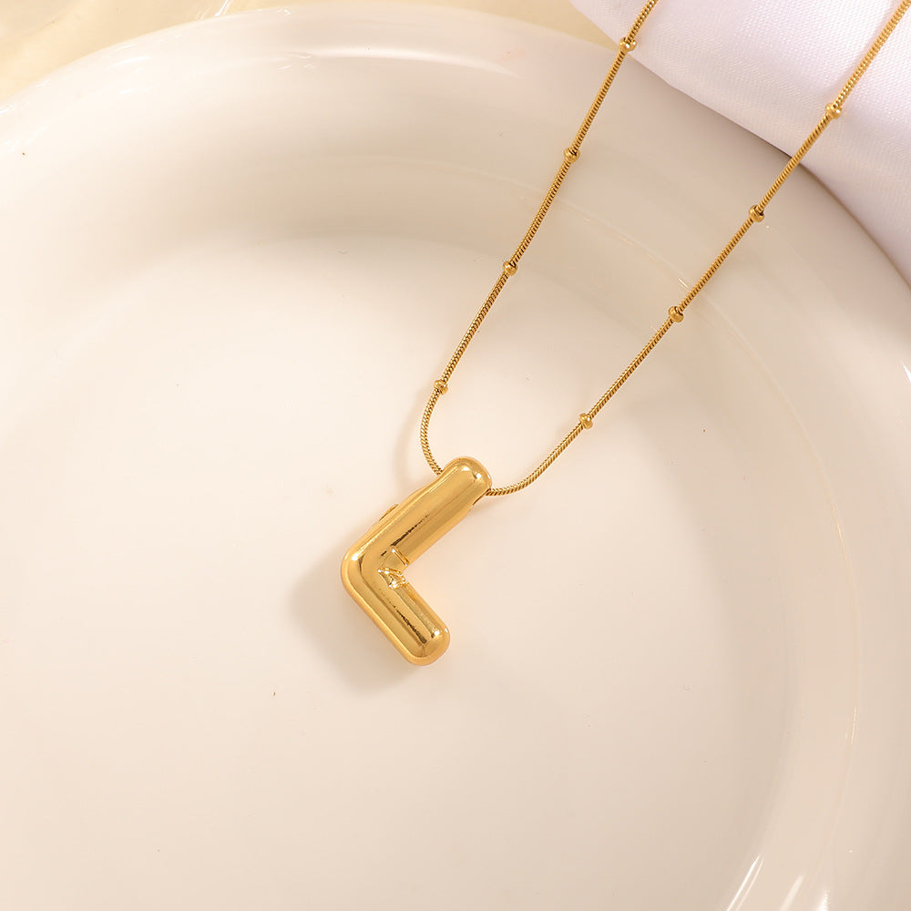 Women's necklace with curved letter pendant Symbol Fashion