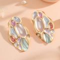 Ladies ear clips with elaborate, colorful shell design Symbol Fashion