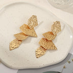 Women's elegant earrings with rustic, folded design Symbol Fashion