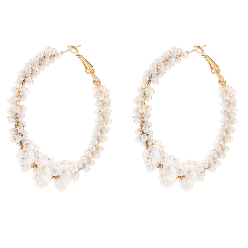 Women’s hoops with artistic pearl design Symbol Fashion