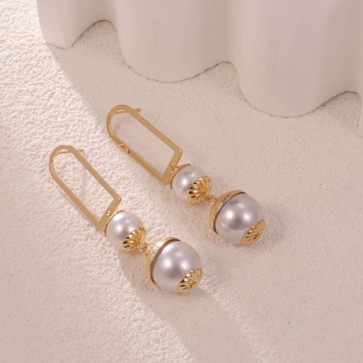Ladies earrings with elegant pearl design Symbol Fashion