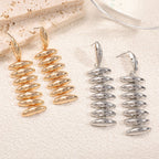 Ladies Hanging Earrings in Modern Spiral Design Symbol Fashion