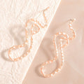 Ladies earrings in elegant wave pattern Symbol Fashion