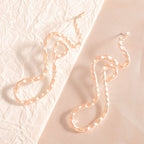 Ladies earrings in elegant wave pattern Symbol Fashion