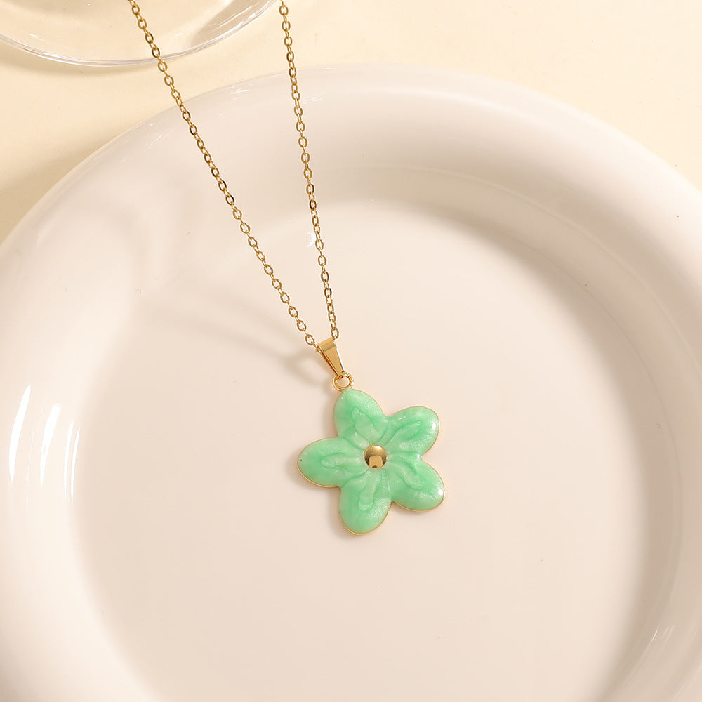 Women’s necklace with elaborately designed flower pendant Symbol Fashion