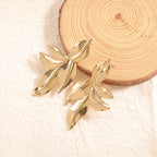 Women’s earrings with elegant leaf design Symbol Fashion