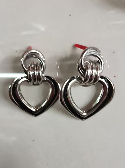 Women’s earrings in modern heart design Symbol Fashion