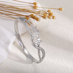 Women's bangle with elegant infinity pattern and sparkling zirconia Symbol Fashion