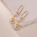 Ladies earrings with elegant pearl design Symbol Fashion