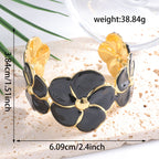 Ladies cuff bracelet with elaborate flower pattern Symbol Fashion