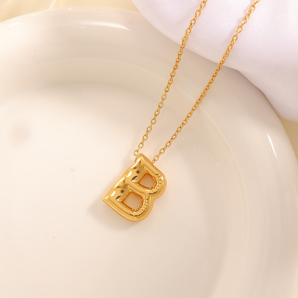 Women's necklace with curved letter pendant Symbol Fashion