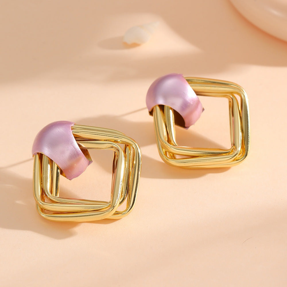 Women modern earrings with asymmetrical design Symbol Fashion