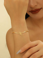 Ladies' bangle with elegant curved design Symbol Fashion