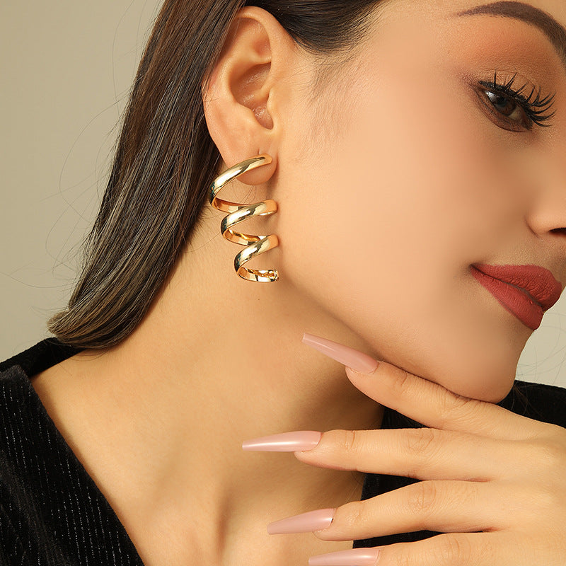 Women's Hanging Earrings with Elegant, Curved Design Symbol Fashion