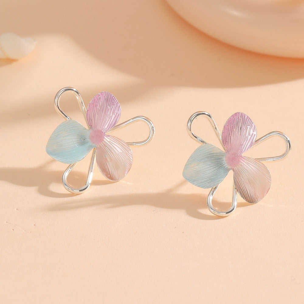 Women's hair clips in playful flower design Symbol Fashion