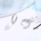 Ladies earrings with elegant zirconia decorations and pearl pendants Symbol Fashion