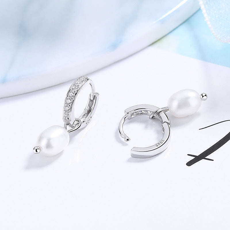 Ladies earrings with elegant zirconia decorations and pearl pendants Symbol Fashion