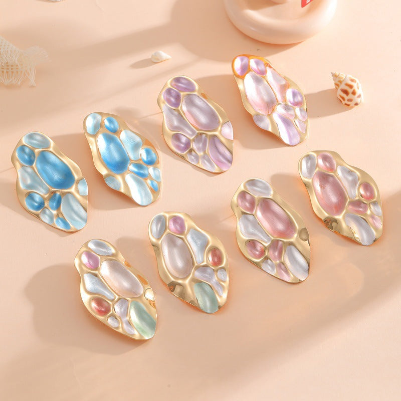 Ladies ear clips with elaborate, colorful shell design Symbol Fashion